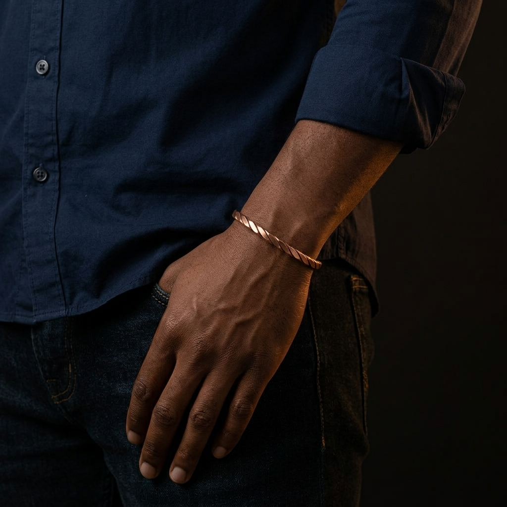 Tri Twist Filed copper cuff worn on the wrist