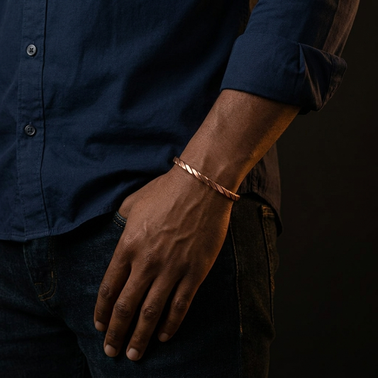 Tri Twist Filed copper cuff worn on the wrist