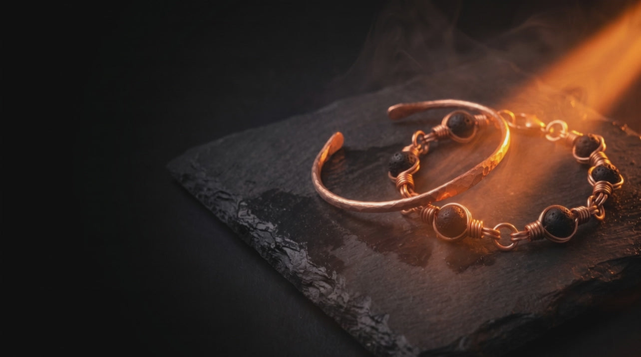 The July Bundle: copper bangle and lava stone bracelet in ember light